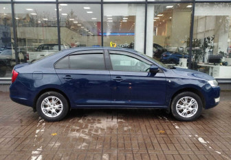 Подержанный автомобиль Skoda Rapid Liftback 2014 года (4 фото)