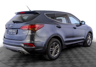 Подержанный автомобиль Hyundai Santa Fe 2015 года (5 фото)