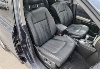 Подержанный автомобиль Nissan X-Trail 2011 года (23 фото)