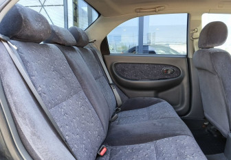 Подержанный автомобиль Kia Spectra Sedan 2006 года (20 фото)
