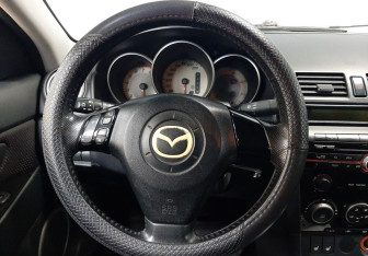 Подержанный автомобиль Mazda 3 Sedan 2008 года (14 фото)
