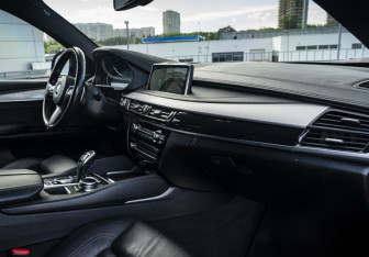 Подержанный автомобиль BMW X6 2018 года (14 фото)