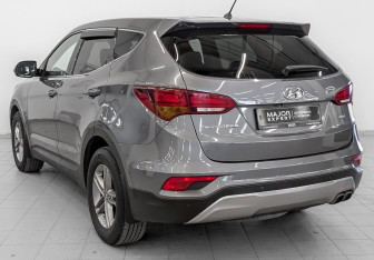 Подержанный автомобиль Hyundai Santa Fe 2016 года (7 фото)