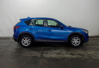 Подержанный автомобиль Mazda CX-5 2013 года (8 фото)
