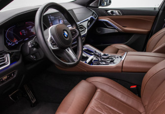 Подержанный автомобиль BMW X6 2021 года (10 фото)
