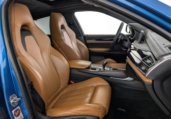 Подержанный автомобиль BMW X6 M 2016 года (24 фото)