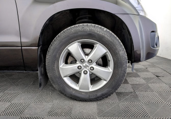 Подержанный автомобиль Suzuki Grand Vitara 2015 года (18 фото)