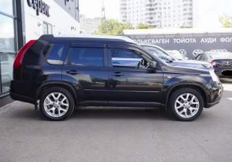 Подержанный автомобиль Nissan X-Trail 2013 года (4 фото)