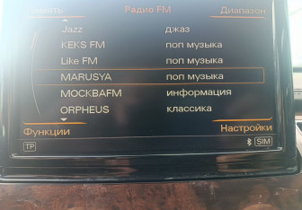 Подержанный автомобиль Audi A8 2014 года (16 фото)