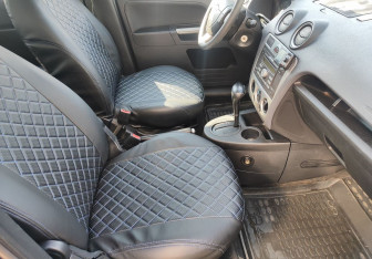 Подержанный автомобиль Ford Fusion 2011 года (9 фото)