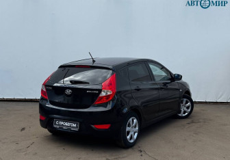 Подержанный автомобиль Hyundai Solaris Hatchback 2013 года (8 фото)
