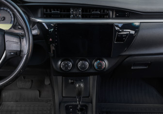 Подержанный автомобиль Toyota Corolla Sedan 2013 года (13 фото)