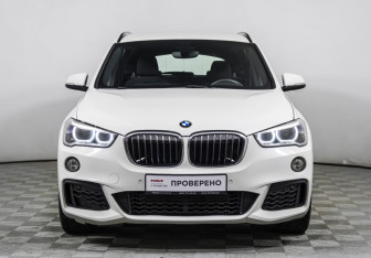 Подержанный автомобиль BMW X1 2015 года (2 фото)