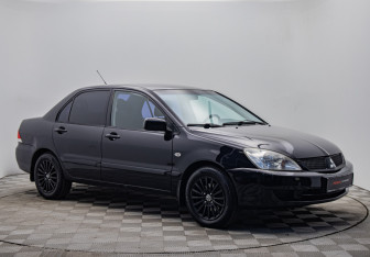Подержанный автомобиль Mitsubishi Lancer Sedan 2006 года (7 фото)