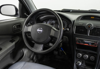 Подержанный автомобиль Nissan Almera Classic 2012 года (10 фото)