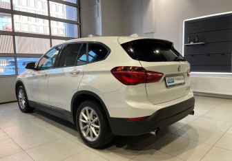 Подержанный автомобиль BMW X1 2018 года (7 фото)
