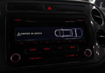 Подержанный автомобиль Volkswagen Tiguan 2011 года (16 фото)