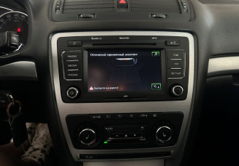Подержанный автомобиль Skoda Octavia Wagon 2013 года (12 фото)
