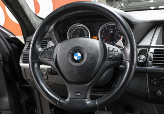 Подержанный автомобиль BMW X6 M 2013 года (19 фото)