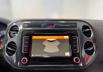 Подержанный автомобиль Volkswagen Tiguan 2012 года (16 фото)