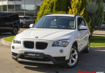 Подержанный автомобиль BMW X1 2014 года (16 фото)