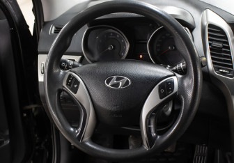 Подержанный автомобиль Hyundai i30 Hatchback 2013 года (17 фото)