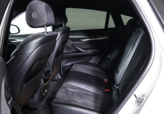 Подержанный автомобиль BMW X6 2018 года (11 фото)