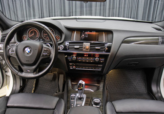 Подержанный автомобиль BMW X4 2016 года (14 фото)