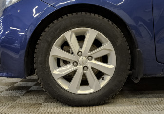 Подержанный автомобиль Kia Rio Sedan 2016 года (18 фото)