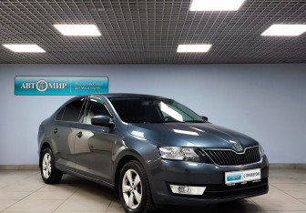 Подержанный автомобиль Skoda Rapid Liftback 2015 года (3 фото)