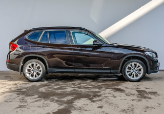 Подержанный автомобиль BMW X1 2014 года (4 фото)