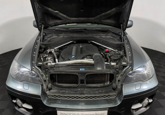 Подержанный автомобиль BMW X6 2010 года (10 фото)