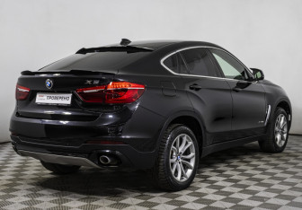 Подержанный автомобиль BMW X6 2015 года (5 фото)