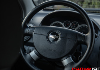 Подержанный автомобиль Chevrolet Aveo Hatchback 2011 года (11 фото)
