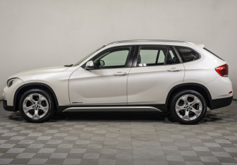 Подержанный автомобиль BMW X1 2014 года (8 фото)