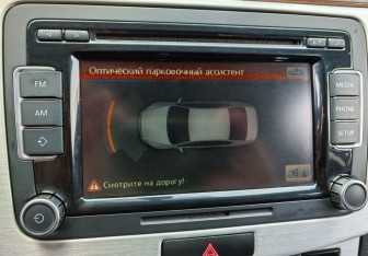 Подержанный автомобиль Volkswagen Passat Sedan 2013 года (14 фото)