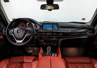 Подержанный автомобиль BMW X6 2018 года (14 фото)