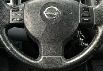 Подержанный автомобиль Nissan Tiida Hatchback 2007 года (13 фото)