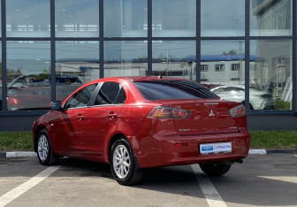 Подержанный автомобиль Mitsubishi Lancer Sedan 2012 года (7 фото)