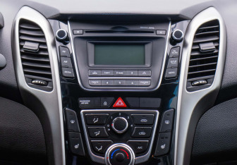 Подержанный автомобиль Hyundai i30 Hatchback 2015 года (14 фото)