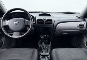 Подержанный автомобиль Nissan Almera Classic 2008 года (12 фото)