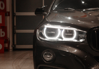 Подержанный автомобиль BMW X6 2016 года (28 фото)