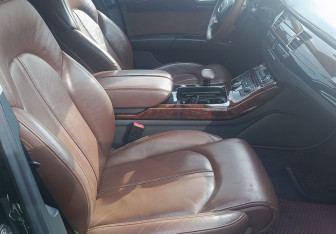 Подержанный автомобиль Audi A8 2014 года (9 фото)