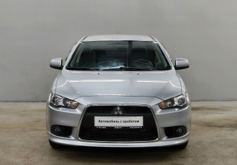Подержанный автомобиль Mitsubishi Lancer Sedan 2011 года (2 фото)
