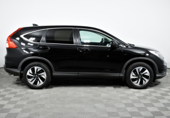 Подержанный автомобиль Honda CR-V 2015 года (4 фото)