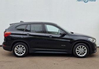 Подержанный автомобиль BMW X1 2015 года (4 фото)