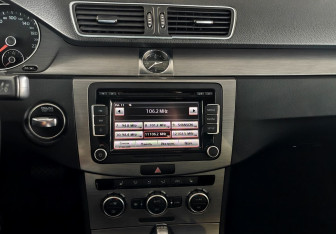 Подержанный автомобиль Volkswagen Passat Sedan 2012 года (14 фото)