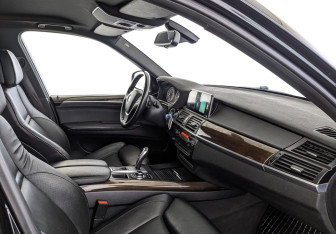 Подержанный автомобиль BMW X5 2013 года (13 фото)
