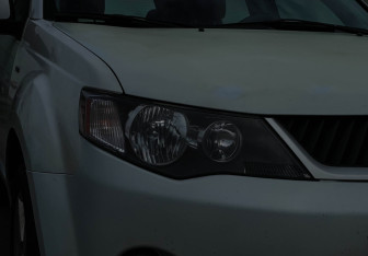 Подержанный автомобиль Mitsubishi Outlander 2008 года (15 фото)