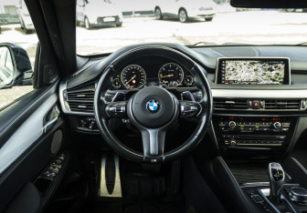 Подержанный автомобиль BMW X6 2018 года (12 фото)